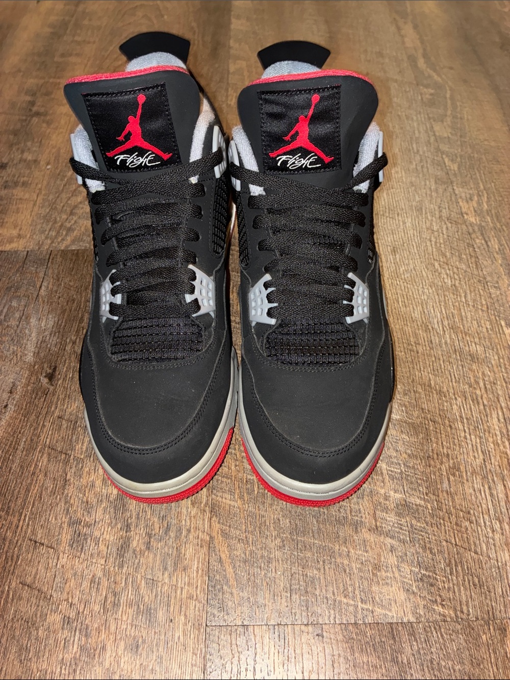 Nike Men's Bred Jordan 4’s Black and Red Retro Basketball Sneakers